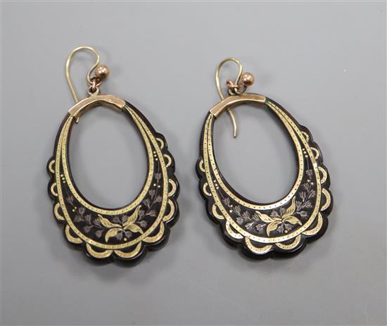 A pair of Victorian tortoiseshell and yellow metal pique loop earrings, 39mm.